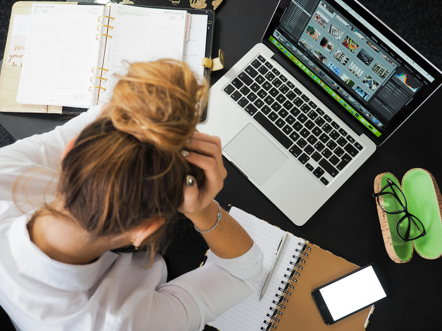 Female student struggling to focus while studying.