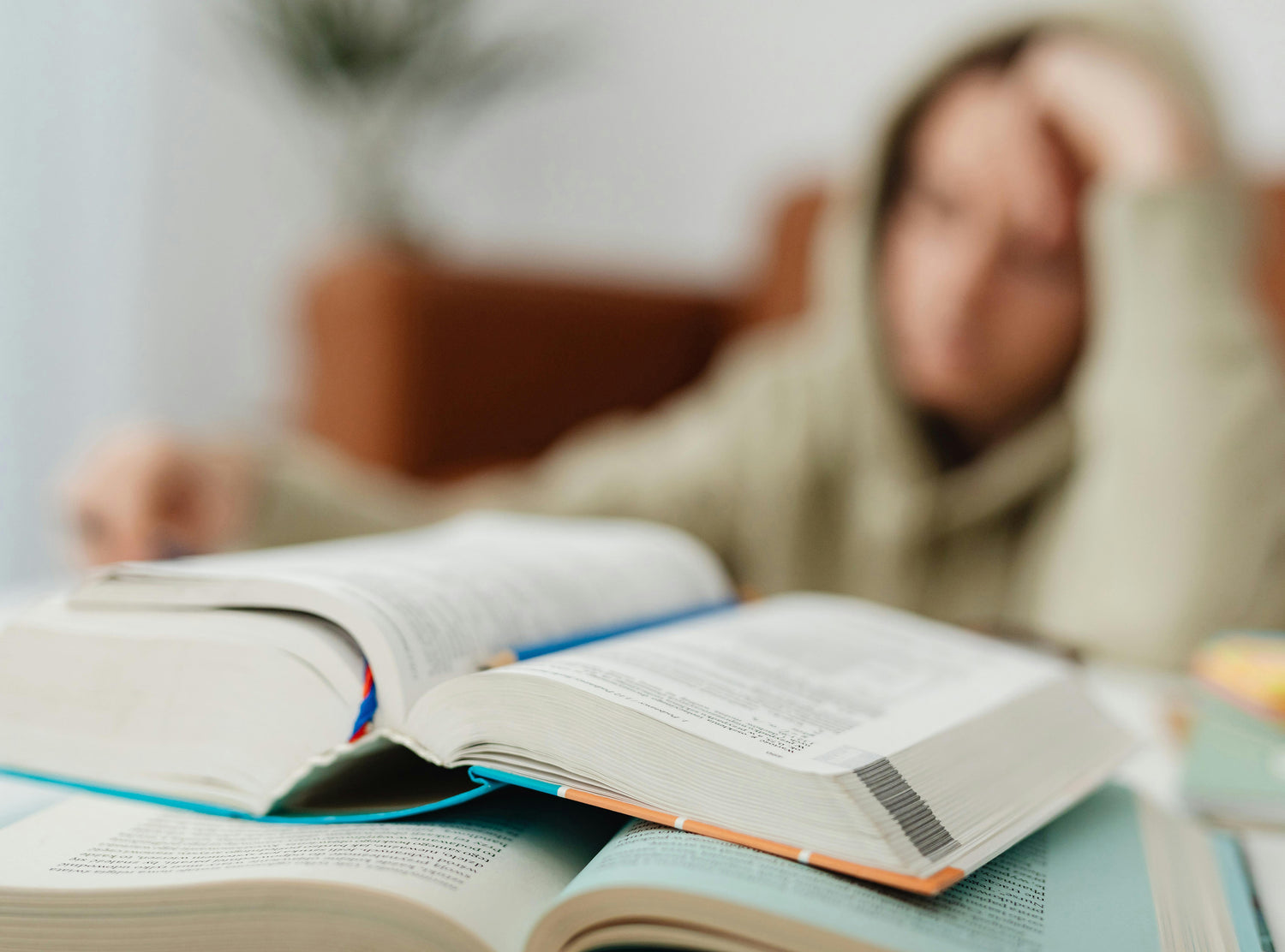 Bored student staring at book.